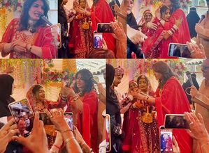 Raveena Tandon gifts gold bangles to bride during a mass wedding ceremony