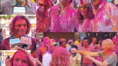 Foreign tourists join Holi festivities in Varanasi