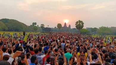 Tourists gather at Cambodia’s Angkor Wat to watch equinox sunrise