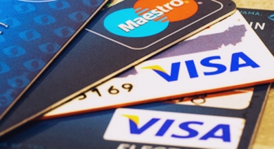 UK payments regulator accuses Visa, Mastercard of excessive fees, restricting competition