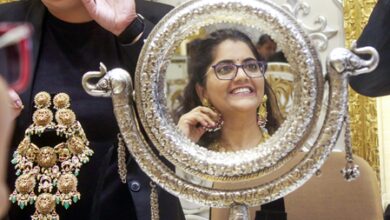 Gold slips on strong dollar, silver rebounds on MCX; Rupee hits record low