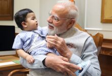 PM Modi cradles little Omy, melts hearts across social media​
