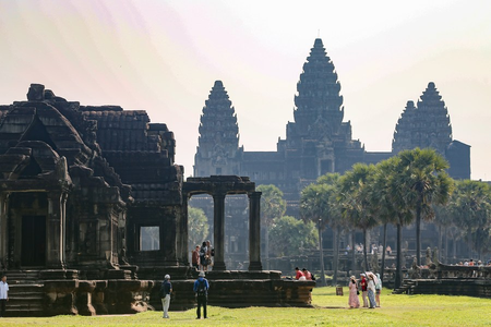 Huge crowds of tourists enjoy equinox sunrise at Cambodia’s iconic Angkor Wat