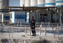 Iranian forces warn of broader retaliation if US targets its power facilities