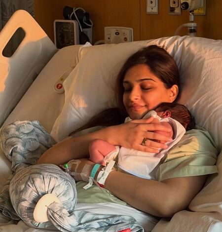 Sonam Kapoor shares first pic holding her newborn close to her heart from the hospital Sonam Kapoor shares first pic holding her newborn close to her heart from the hospital