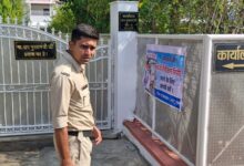 NSUI members paste posters outside Dy CM Rajendra Shukla’s office in Bhopal