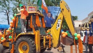 Bengal polls: BJP candidate rides bulldozer to file his nomination