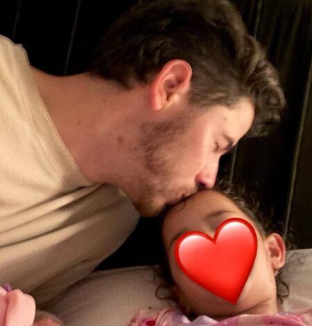 Nick Jonas shares adorable pic of him kissing little Malti Marie while putting her to sleep