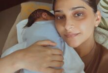 Sonam Kapoor flaunts her dark circles as she lovingly holds her newborn son