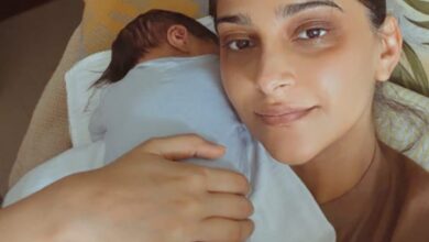 Sonam Kapoor flaunts her dark circles as she lovingly holds her newborn son