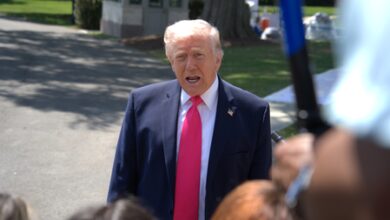 Trump warns Iran, sends team for talks