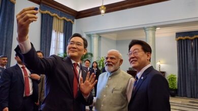 Samsung chief clicks selfie with PM Modi, S. Korean President at Noida facility