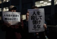 Japan officially eases arms export rules to allow weapons sales despite protests