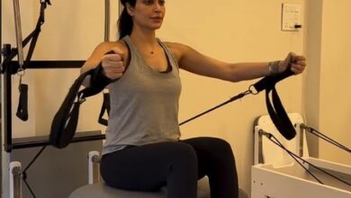 Mommy-to-be Karishma Tanna flaunts her baby bump as she works out in the gym