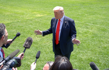 Trump reviews Iran deal, hints troop cuts