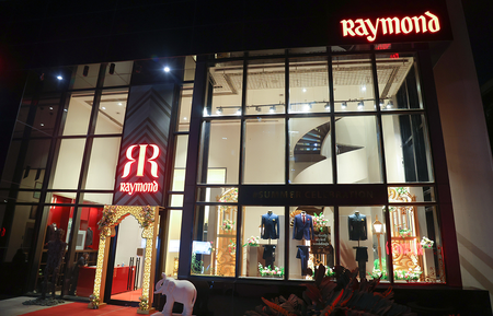 Raymond Limited’s Q4 profit slumps 99 pc on one-time loss