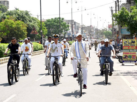 Gujarat Governor cycles to Gurukul after train journey, urges fuel conservation