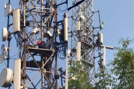 High-voltage drama in Jharkhand: Youth climbs 200-foot tower to press for marriage with girlfriend High-voltage drama in Jharkhand: Youth climbs 200-foot tower to press for marriage with girlfriend