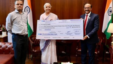 SBI presents Rs 8,813 crore dividend cheque to centre for FY26 SBI presents Rs 8,813 crore dividend cheque to centre for FY26