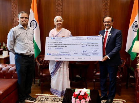 SBI presents Rs 8,813 crore dividend cheque to centre for FY26 SBI presents Rs 8,813 crore dividend cheque to centre for FY26