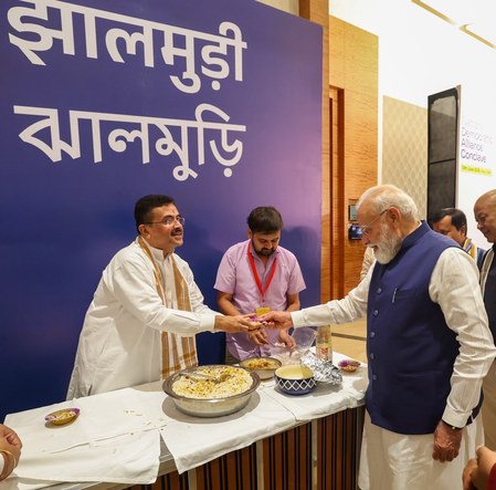 Bengal CM Adhikari serves ‘jhalmuri’ to PM Modi in NDA meeting Bengal CM Adhikari serves ‘jhalmuri’ to PM Modi in NDA meeting