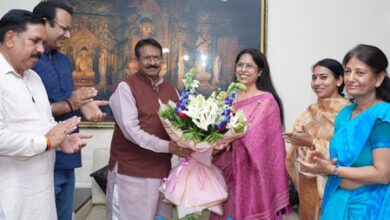 Delhi BJP chief gives booklet on PM Modi’s govt to Rajguru College principal Delhi BJP chief gives booklet on PM Modi’s govt to Rajguru College principal