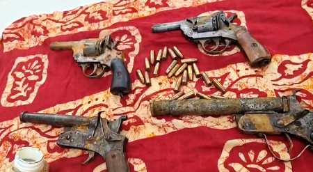 Huge cache of arms, ammunitions recovered from fish pond in West Bengal Huge cache of arms, ammunitions recovered from fish pond in West Bengal