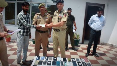 Police in J&K’s Poonch return 50 recovered mobile phones to owners