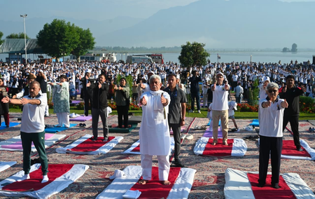 J&K L-G Sinha leads hundreds of Yoga enthusiasts on Dal Lake bank