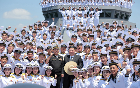 North Korea’s Supreme Leader Kim Jong-un oversees artillery, missile tests