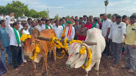 Telangana minister ploughs field, sows seeds to mark Eruvaka Purnima