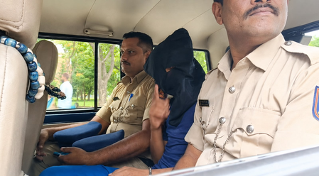Karnataka: Terror suspect points finger at media while being escorted by police