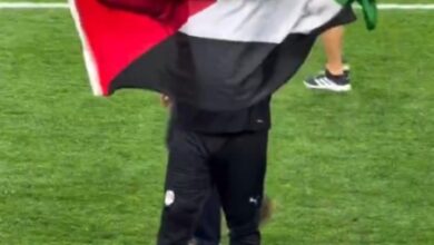 Egypt coach raises Palestinian flag after his side’s first knockout win at a FIFA WC