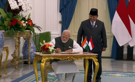 PM Modi signs guestbook upon meeting Indonesian Prez Subianto at Istana Merdeka PM Modi signs guestbook upon meeting Indonesian Prez Subianto at Istana Merdeka