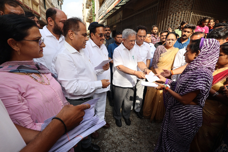 Union Minister CR Paatil distributes flood relief assistance to affected families in Surat Union Minister CR Paatil distributes flood relief assistance to affected families in Surat