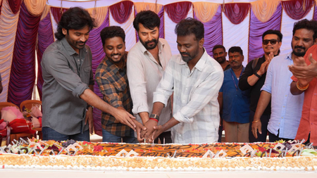 Mammootty, Dhanush, Rajkumar Periasamy, Kalaivanan jointly celebrate their National Award wins on sets of ‘Om’ Mammootty, Dhanush, Rajkumar Periasamy, Kalaivanan jointly celebrate their National Award wins on sets of ‘Om’
