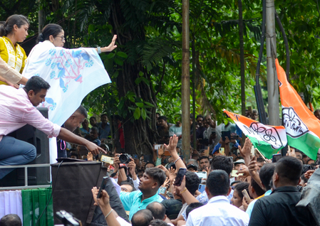 Mamata Banerjee rides scooter to reach protest site after Trinamool leaders detention