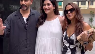 Karishma Tanna asks paps to stop focusing on her baby bump as she poses with Neha Dhupia, Angad Bedi Karishma Tanna asks paps to stop focusing on her baby bump as she poses with Neha Dhupia, Angad Bedi