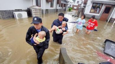 Over 95,000 evacuated as heavy rains hit Beijing