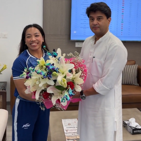 Union Min Jyotiraditya Scindia meets Mirabai Chanu after historic CWG triumph Union Min Jyotiraditya Scindia meets Mirabai Chanu after historic CWG triumph