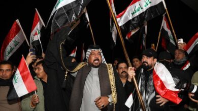 Iraqi militia umbrella group says ‘postpones’ retaliation against US forces Iraqi militia umbrella group says ‘postpones’ retaliation against US forces