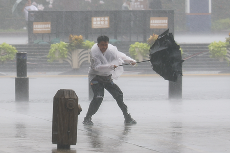 Hundreds of thousands evacuated as Typhoon Dolphin brings heavy rain to eastern China