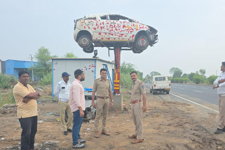 Gujarat: Damaged car displayed on NH-48 to warn motorists against unsafe driving Gujarat: Damaged car displayed on NH-48 to warn motorists against unsafe driving