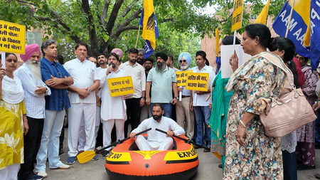 AAP protests over poor drainage, bad roads in Chandigarh AAP protests over poor drainage, bad roads in Chandigarh