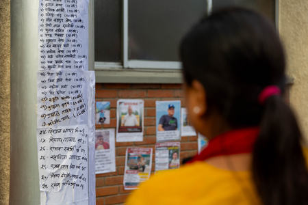 Families put up posters outside Kathmandu hospital in hope of finding their loved ones