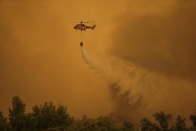 Two firefighting helicopters collide while battling wildfire in Greece
