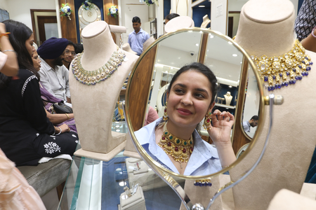 Gold, silver jump up to 3 pc over week amid softer crude oil prices (Lead)