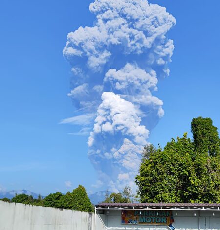 Indonesia extends closure of four airports as volcano erupts again