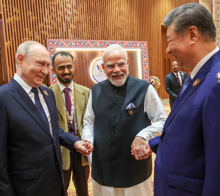 PM Modi’s warm camaraderie with Putin, Xi on full display at BRICS Summit PM Modi’s warm camaraderie with Putin, Xi on full display at BRICS Summit