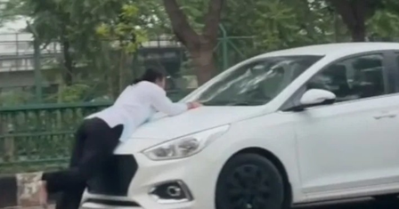 ‘Boyfriend’ drags woman on car bonnet in Lucknow ‘Boyfriend’ drags woman on car bonnet in Lucknow